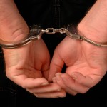 B3K6WM–Handcuffs_3152651b