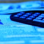 depositphotos_69520483-Tax-documents-calculator-and-money