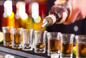 pouring-brown-liquor-shots