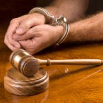 Arrested man and gavel