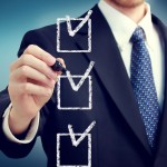 Business Man With Checkboxes