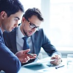 auditing-team-going-over-report