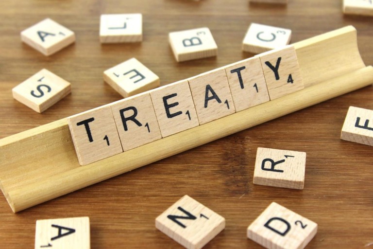 Treaties as contract theory, textualism, and interpretation