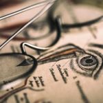 illustration-of-an-eye-with-eyeglasses-sitting-on-top-e1570466495630