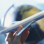 Hand Holding Toy Plane